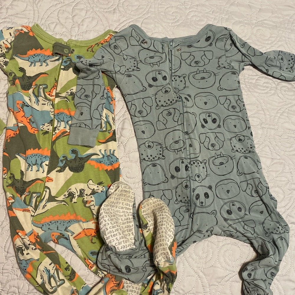 2 pair of footed pajamas